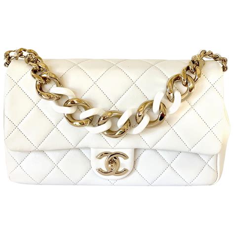 white chanel bag with gold chain|Chanel pouch with chain.